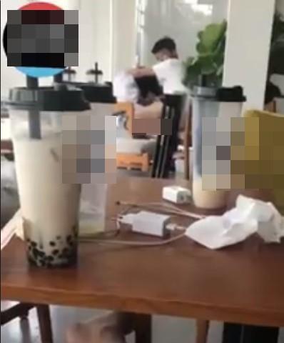 Tiếp tục lan truyền clip đôi nam nữ vô tư diễn cảnh nóng tại ban công quán trà sữa ở Hà Nội-2