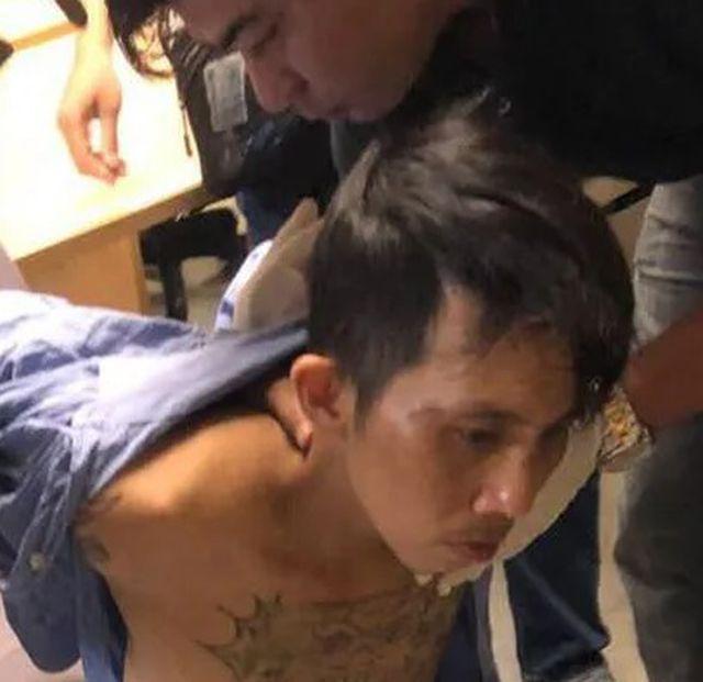 Người đàn ông phi xe máy vào sân bay Tân Sơn Nhất, rút súng đe dọa-1