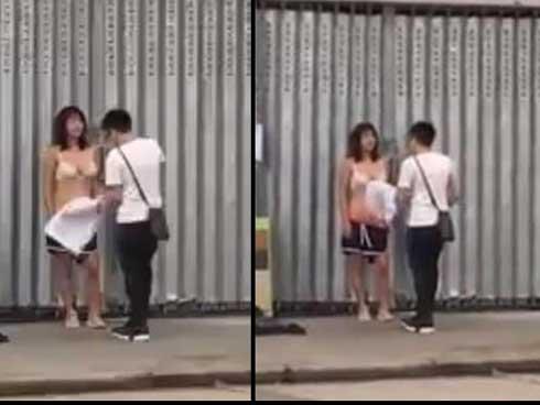 Cãi nhau với chồng, cô vợ trẻ tức giận lột phăng quần áo, lộ cả đồ lót giữa phố-2