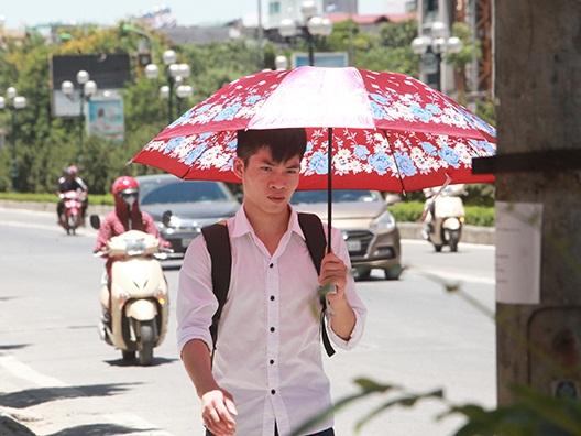 Miền Bắc nắng cháy da, nhiệt độ tăng chóng mặt có nơi 42 độ C-3