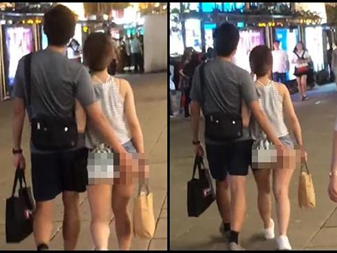 Cô gái gây sốc khi mặc quần hở nửa vòng 3 nhưng choáng hơn là hình ảnh người yêu biến thái vô tư động chạm vùng nhạy cảm