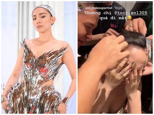 Tóc Tiên đau đớn, suýt khóc khi đội mũ đính bằng súng bắn keo