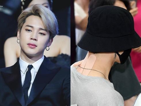 Fan xót xa khi thấy Jimin (BTS) kiệt sức xuất hiện tại sân bay với chi chít miếng dán giảm đau trên người
