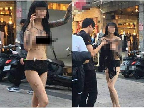 Diện bikini nhỏ xíu chỉ đủ che chắn vùng nhạy cảm rồi vô tư dạo phố ngày mưa, cô gái trẻ bị ném đá sấp mặt-3