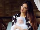 Hoa hậu Nga chật vật nuôi con sau khi ly hôn cựu vương Malaysia
