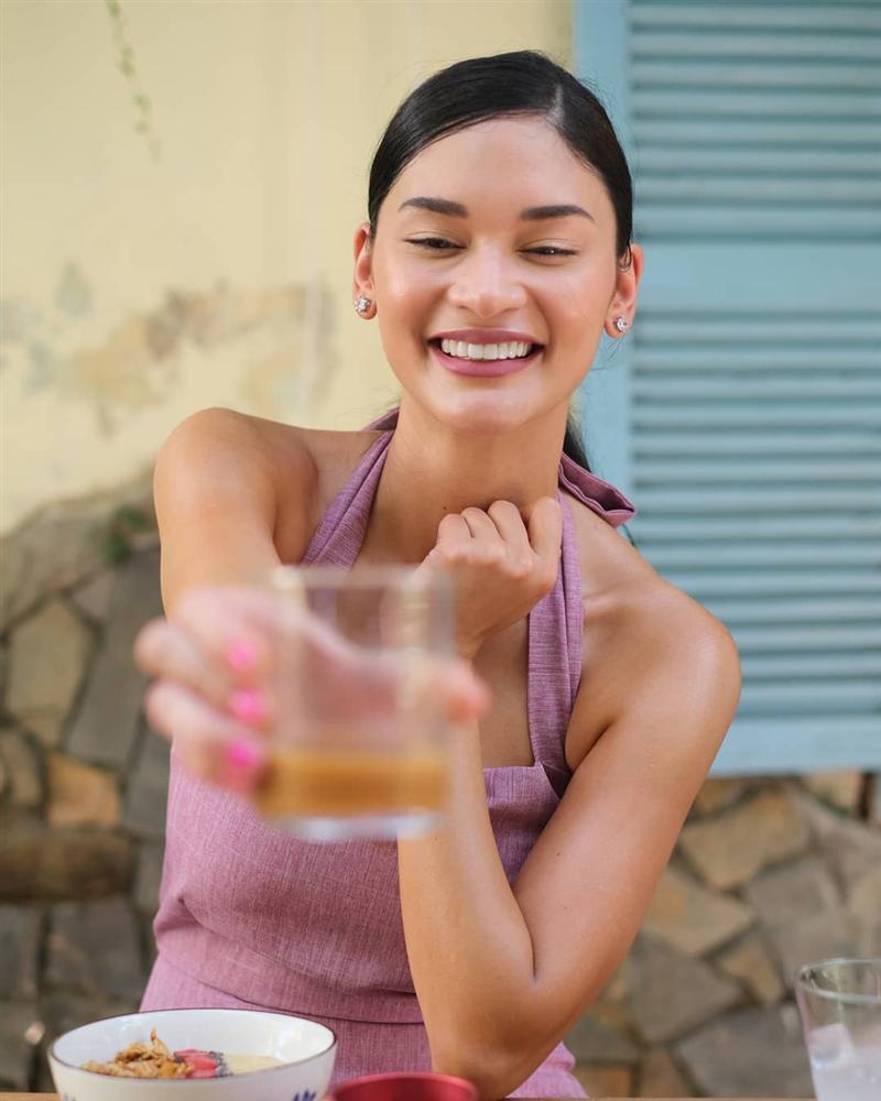 Hoa hậu Hoàn vũ bất ngờ diện áo dài nền nã, khoe nhan sắc xinh đẹp giữa phố cổ Hội An-4