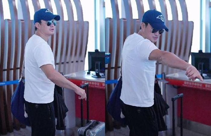 Ngô Kinh xua đuổi, nổi giận với phóng viên ở sân bay-1