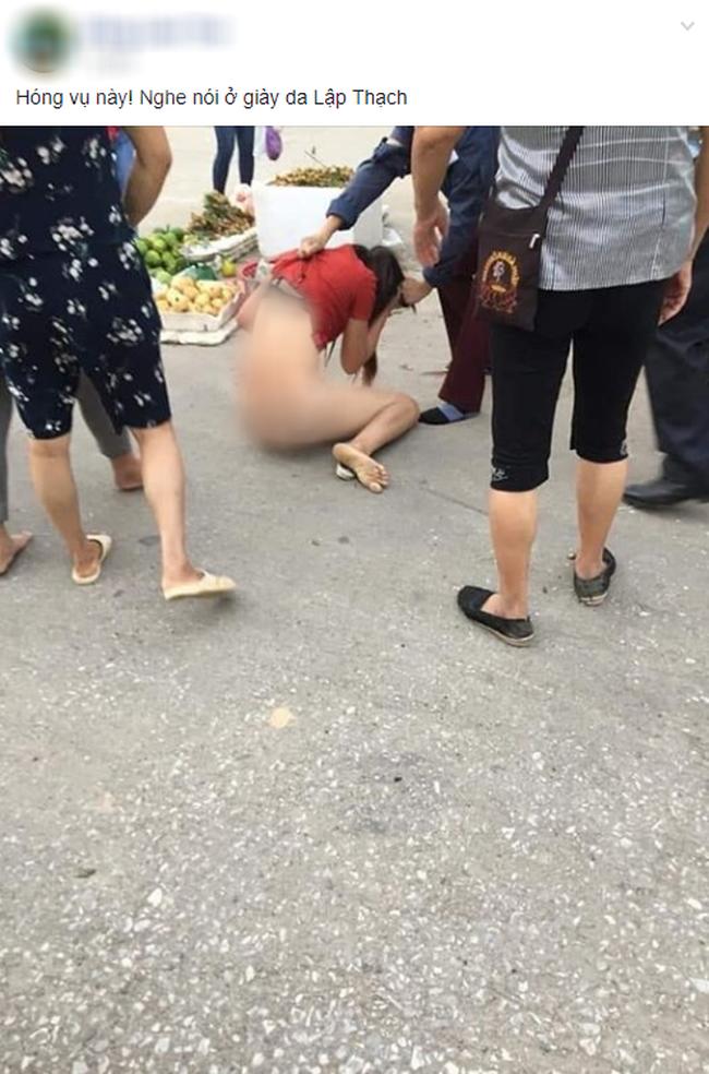 Xôn xao hình ảnh cô gái nghi bị đánh ghen, túm tóc, lột đồ lộ hết cơ thể-1