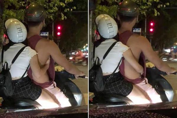 Thanh niên mặc chiếc áo kì lạ ra đường nhưng bàn tay hư hỏng của cô gái mới là thứ đáng chú ý-1