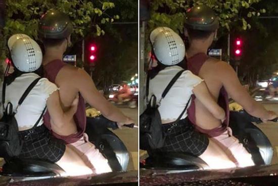 Thanh niên mặc chiếc áo kì lạ ra đường nhưng 'bàn tay hư hỏng' của cô gái mới là thứ đáng chú ý