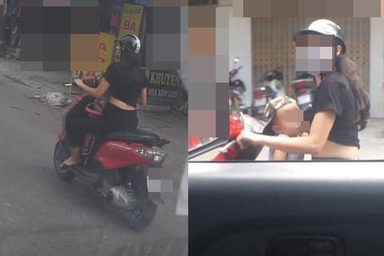Vừa phóng xe máy vừa cho con bú, mẹ trẻ ở Hà Nội làm người đi đường nóng mắt