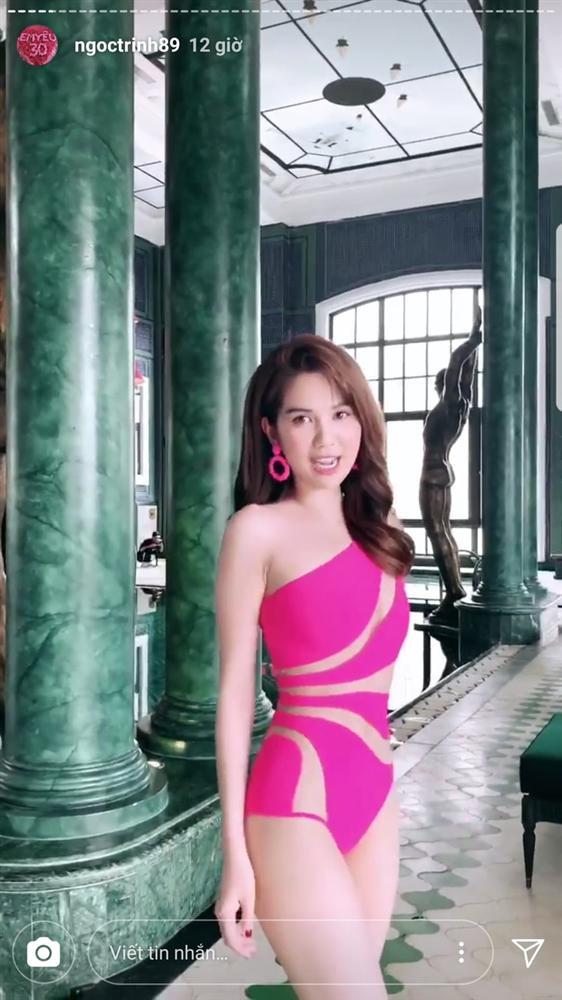 Đẳng cấp eo thon như Ngọc Trinh: Dùng 2 cái kẹp giấy để bóp đồ bơi-2