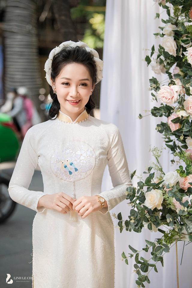 MC thời sự trẻ nhất VTV khoe ảnh lấy chồng, ngoại hình bảnh bao của chú rể bỗng thành tâm điểm-7