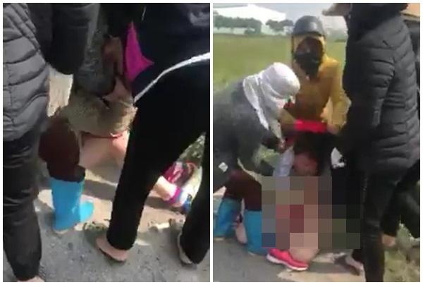 Người phụ nữ bị nhóm người lột đồ, đánh giữa đường: Tại sao đi cướp chồng tao?-1