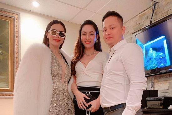 Hồ Ngọc Hà phải đeo kính râm khi chụp hình cùng vợ chồng Á hậu Ngô Trà My