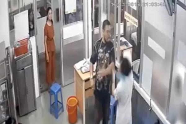 Vụ nữ điều dưỡng bị đánh: Đình chỉ công tác nữ hộ sinh kích động chồng-1