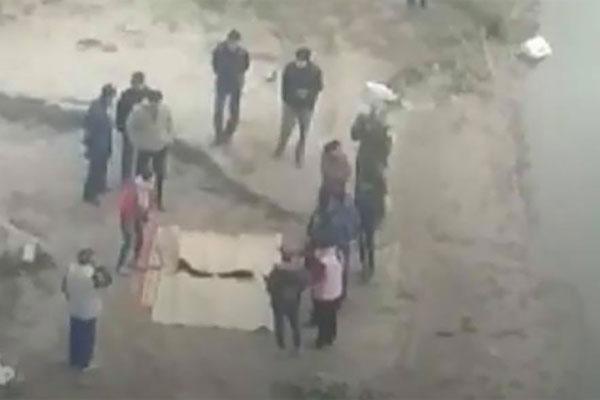 Phát hiện 2 thi thể nghi là bố con bên bờ sông Hồng-1