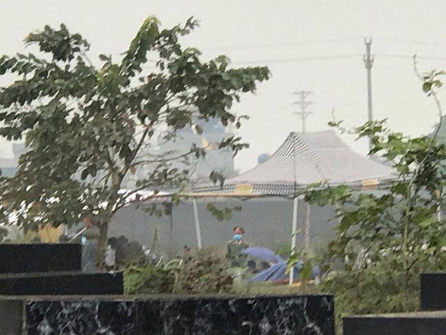 Hoàn tất việc khai quật tử thi nạn nhân tử vong trong vụ em họ đầu độc chị bằng trà sữa ở Thái Bình-3