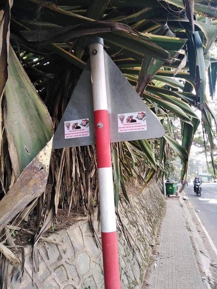 Bạn gái chia tay, thanh niên chơi lớn in mấy chục kg băng rôn có ảnh 2 đứa dán khắp thành phố-7