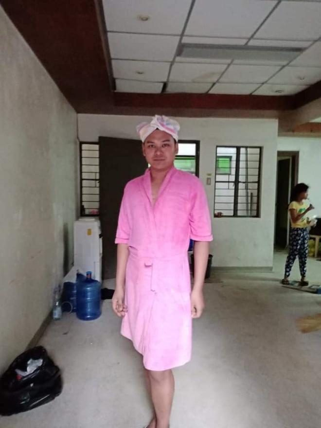 Đang vội sơ tán vì núi lửa, các chàng trai Philippines vẫn tranh thủ tạo dáng với đầm ngủ, giày cao gót từ các nhà hảo tâm-4