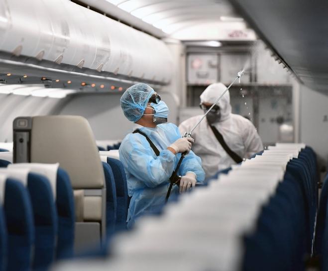 Máy bay chở 243 người phải quay đầu vì khách bịa chuyện nhiễm virus Corona-1