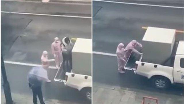 Hình ảnh xúc động: Cặp đôi ôm nhau trước lúc người chồng bị cách ly vì nghi nhiễm 2019-nCoV-2