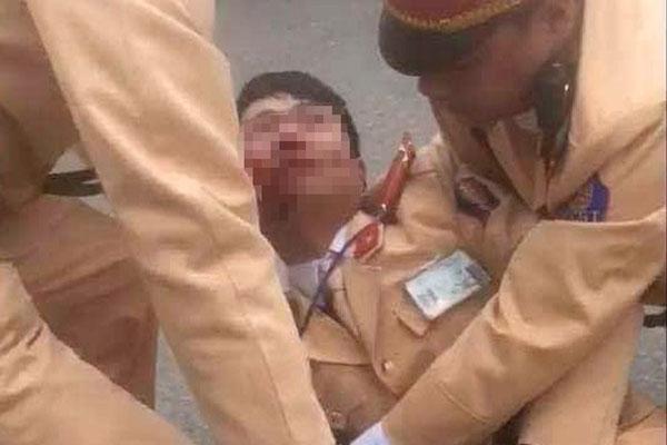 Danh tính đôi nam nữ vượt đèn đỏ, tông gục Trung úy CSGT ở Quốc lộ 32-2