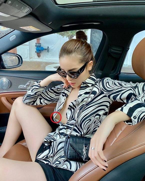 Cố tình phanh cúc áo tạo dáng bá đạo trên xe ô tô, Hoa hậu Kỳ Duyên bị soi hớ hênh điểm nhạy cảm-2