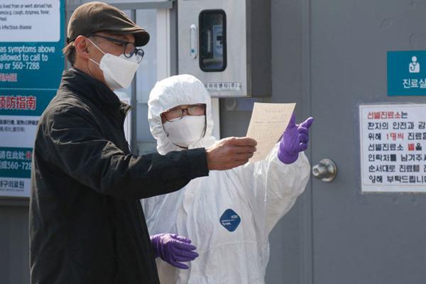 Hàn Quốc: Thêm 52 trường hợp dương tính với virus corona, tổng cộng 82 người đã lây từ bệnh nhân siêu lây nhiễm-1