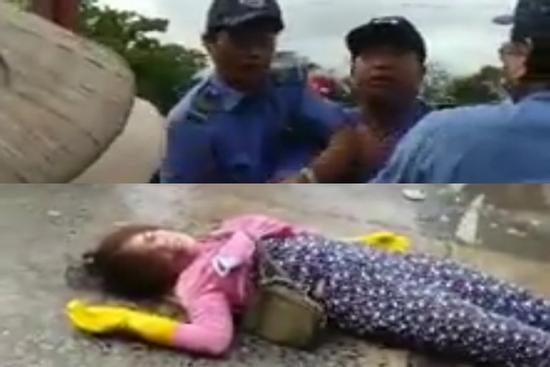 Nữ tiểu thương ngất xỉu, nằm bất động vì loạt đòn dã man của nhóm đàn ông mặc đồ bảo vệ
