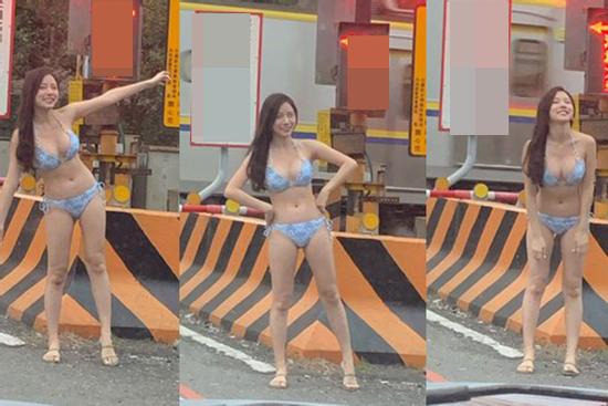 Diện bikini ra đường đứng vẫy xe, cô gái trẻ làm ai đi qua cũng thấy ngao ngán