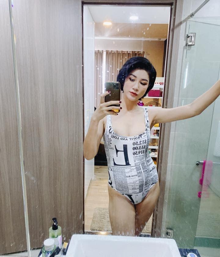 Sau khi đùa về chuyện bầu 4 tháng, Trang Trần tự tin mặc bikini khoe bụng mỡ 109 cm-4