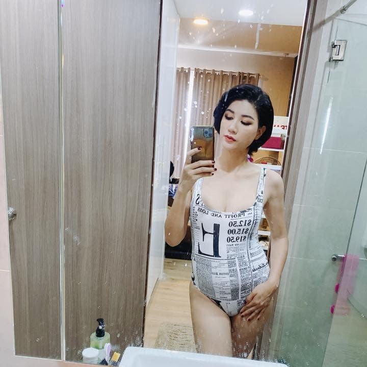 Sau khi đùa về chuyện bầu 4 tháng, Trang Trần tự tin mặc bikini khoe bụng mỡ 109 cm-5