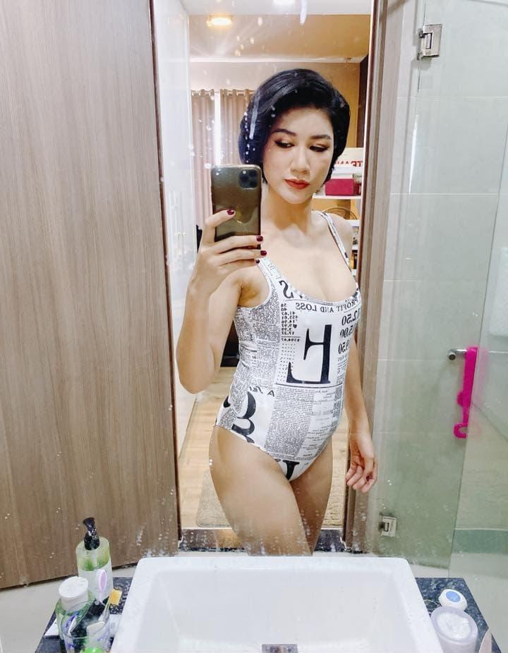 Sau khi đùa về chuyện bầu 4 tháng, Trang Trần tự tin mặc bikini khoe bụng mỡ 109 cm-6