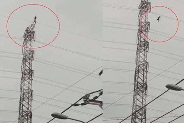 Clip: Người đàn ông đứng trên đỉnh cột điện cao thế rồi nhảy xuống ở TP.HCM-1