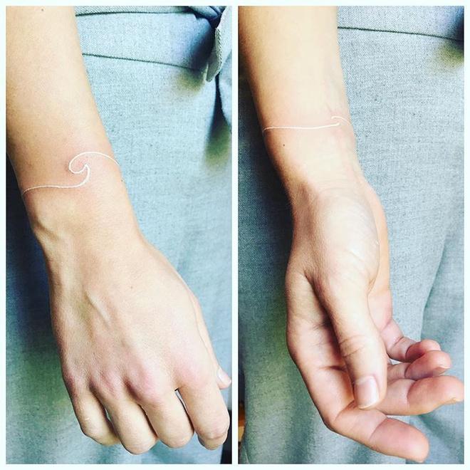 Giới trẻ thế giới rộ mốt xăm hình bằng mực trắng độc đáo-4