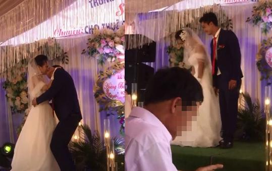 Bị chú rể ghì chặt hôn ngấu nghiến trước mặt quan khách, phản ứng của cô dâu gây bất ngờ