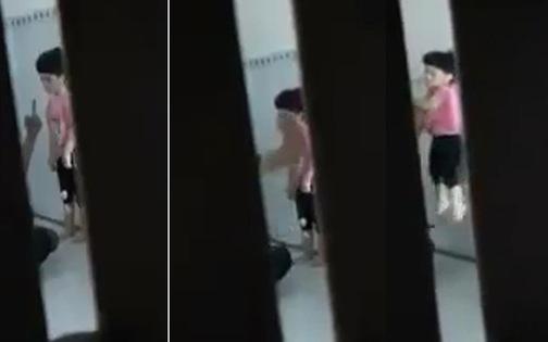 Clip: Cha dượng bóp cổ con riêng của vợ, nắm tóc đập đầu bé vào tường ở TP.HCM-2