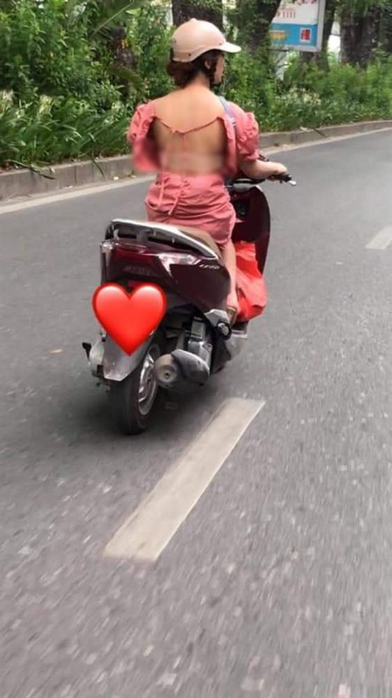 Để nguyên lưng trần dạo phố Hà Nội, cô gái trẻ gây tranh cãi vì thời trang phang thời tiết-1