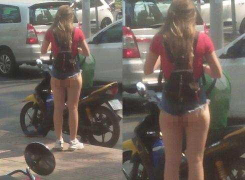 Để nguyên lưng trần dạo phố Hà Nội, cô gái trẻ gây tranh cãi vì thời trang phang thời tiết-6