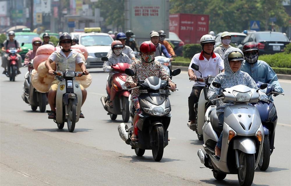 Nhiệt độ miền Bắc  không có xu hướng giảm, người dân tiếp tục ngâm mình trong lò hỏa-1