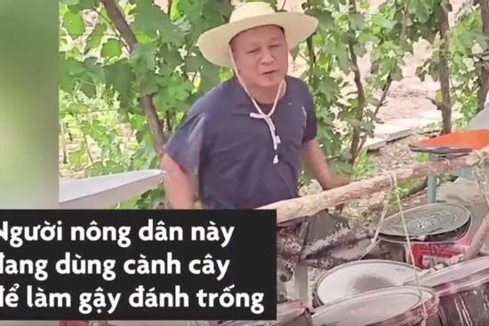 Chơi nhạc bằng bộ trống 'ăn mày', người đàn ông trồng bông bất ngờ hút triệu view