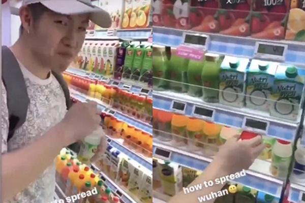 Hai thanh niên gây phẫn nộ khi thản nhiên uống nước ở siêu thị rồi trả về chỗ cũ: Cách lan truyền virus Vũ Hán-2