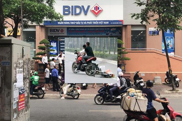 NÓNG: Hai đối tượng nổ súng cướp ngân hàng BIDV Hà Nội giữa ban ngày-1