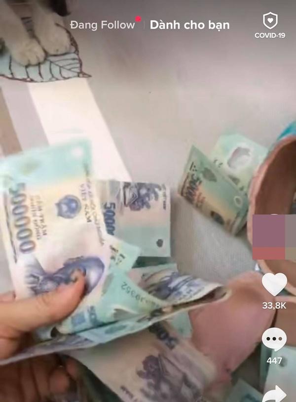 Đút lợn để dành đám cưới bạn thân nhưng bị trả lại, cô gái tức tối đập vỡ, choáng váng khi nhìn bên trong-2