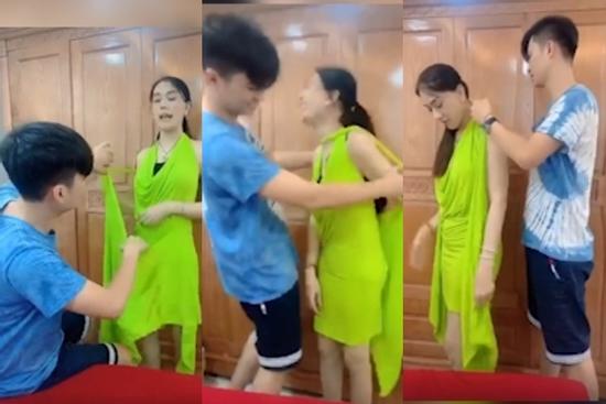Chồng trẻ lóng ngóng tay chân khi mặc đồ cho Lâm Khánh Chi