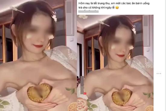 Cô gái trẻ gây tranh cãi khi cởi áo, để bánh nướng trước ngực rồi tạo dáng phản cảm