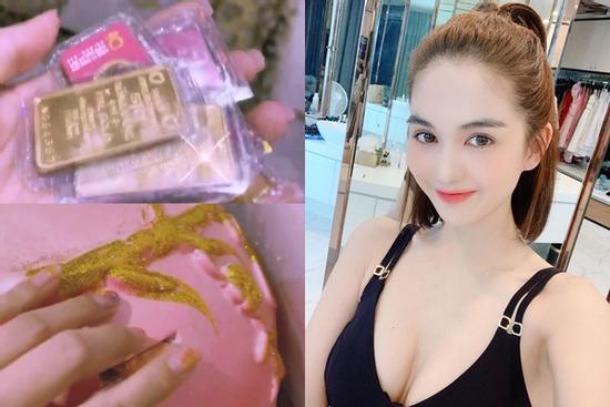 Tròn mắt xem Ngọc Trinh cho heo đất ăn từng miếng vàng