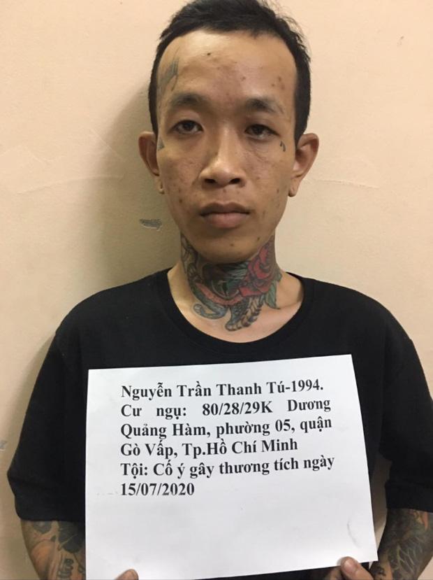 Truy nã gã thợ xăm đánh chém người ở Sài Gòn-1
