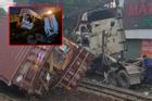 Nhân viên đường sắt ngủ quên không gác chắn, xe container bị tàu hỏa tông đứt đôi ở Bình Dương